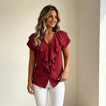 Elegáns nyári női blúz V-nyakkal - fodros és gombos laza ing, puha, lélegző és hűsítő anyagból.