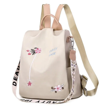 Nagy kapacitású, hímzett, lopásgátló utazóhátizsák