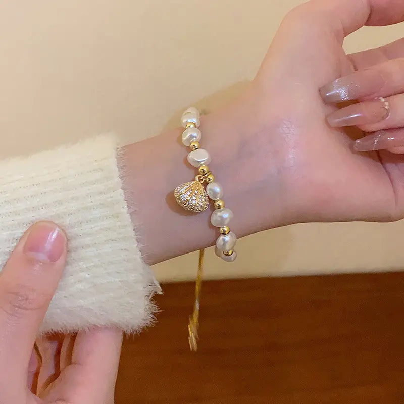 💐✨【Fő karkötő + 5 darab hozzáillő kiegészítő】Barokk édesvízi gyöngy karkötő, egy elegáns és sokoldalú, visszafogott luxusékszer.