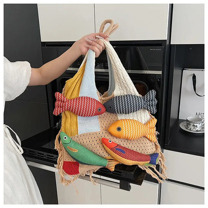 Nagy kapacitású, bojtos, patchwork mintás, sokoldalú gyapjú kötött táska