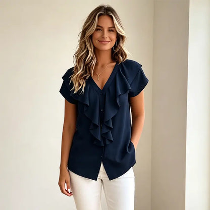 Elegáns nyári női blúz V-nyakkal - fodros és gombos laza ing, puha, lélegző és hűsítő anyagból.
