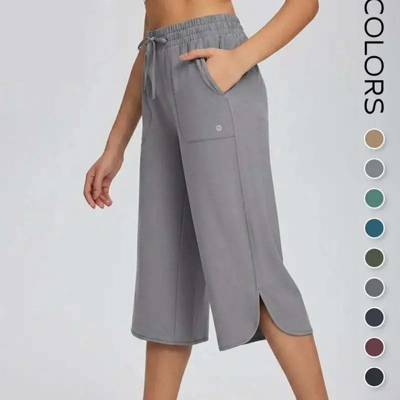 👖 Dámske capri nohavice na jogu so širokými nohavicami – vysoký pás s vreckami, rýchloschnúce, ľahké, ochrana pred slnkom UPF 50+ – voľné a pohodlné na turistiku, do posilňovne, na cestovanie a cvičenie vonku ☀️