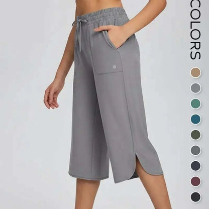 👖 Dámske capri nohavice na jogu so širokými nohavicami – vysoký pás s vreckami, rýchloschnúce, ľahké, ochrana pred slnkom UPF 50+ – voľné a pohodlné na turistiku, do posilňovne, na cestovanie a cvičenie vonku ☀️