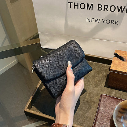 🔥✨【Compra 1 y llévate 1 gratis】⏰Cartera unisex Pebble de piel auténtica con protección RFID🔥
