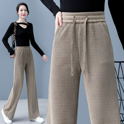 🔥【Kup jeden a jeden dostaneš zdarma】👖 Nové sametové ležérní kalhoty se širokýma nohama, velmi pohodlné na nošení.